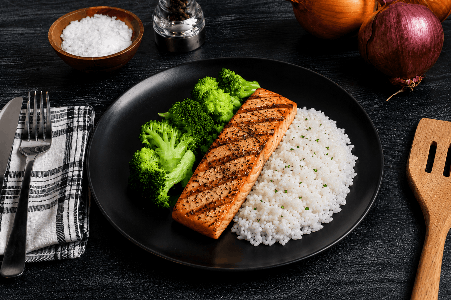 Fresh Atlantic salmon, oven-baked to perfection and lightly seasoned to let its natural flavor shine. Served alongside light & fluffy jasmine rice and tender steamed broccoli for a clean, wholesome meal that's rich in protein, omega-3s, and simple goodness.