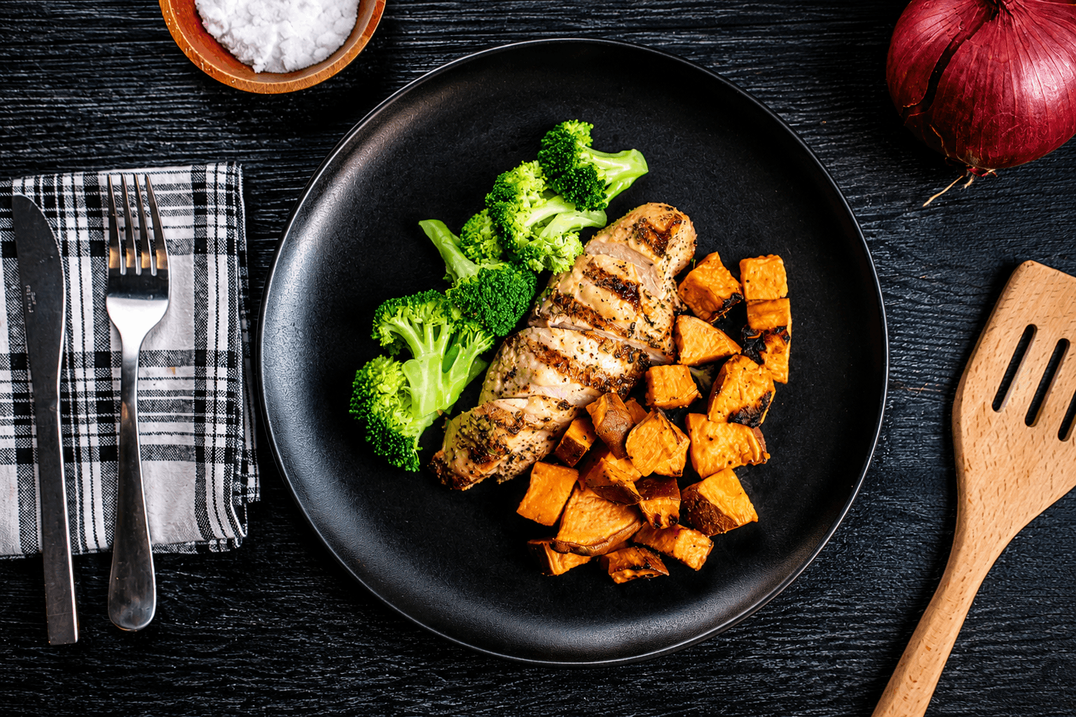 Tender, simply seasoned chicken breast served with roasted sweet potatoes and fresh steamed broccoli for a wholesome, protein-packed meal.