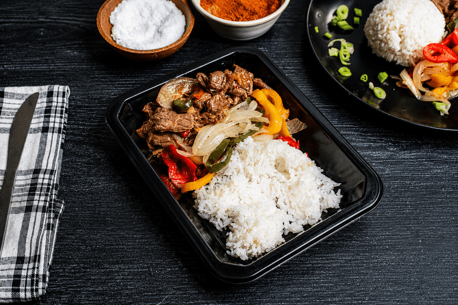 Tender marinated steak, seared to perfection and tossed with sweet bell peppers and caramelized onions in a rich, savory pan sauce. Served over a bed of fluffy jasmine rice for a classic, satisfying meal packed with bold flavor.