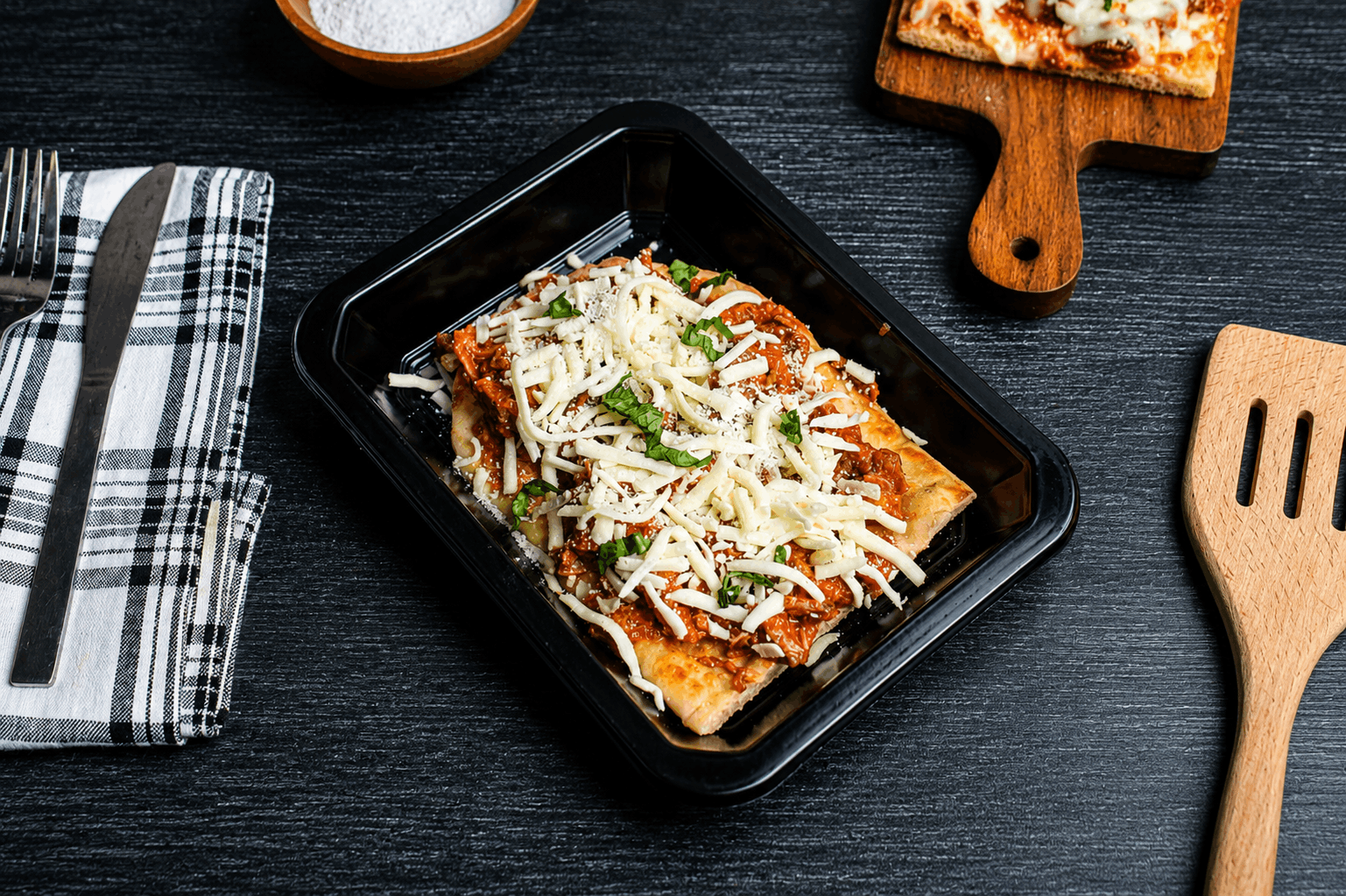 Tender Cuban braised beef in a savory tomato and pepper sofrito, spread over warm flatbread and crowned with melted mozzarella and cotija cheese.