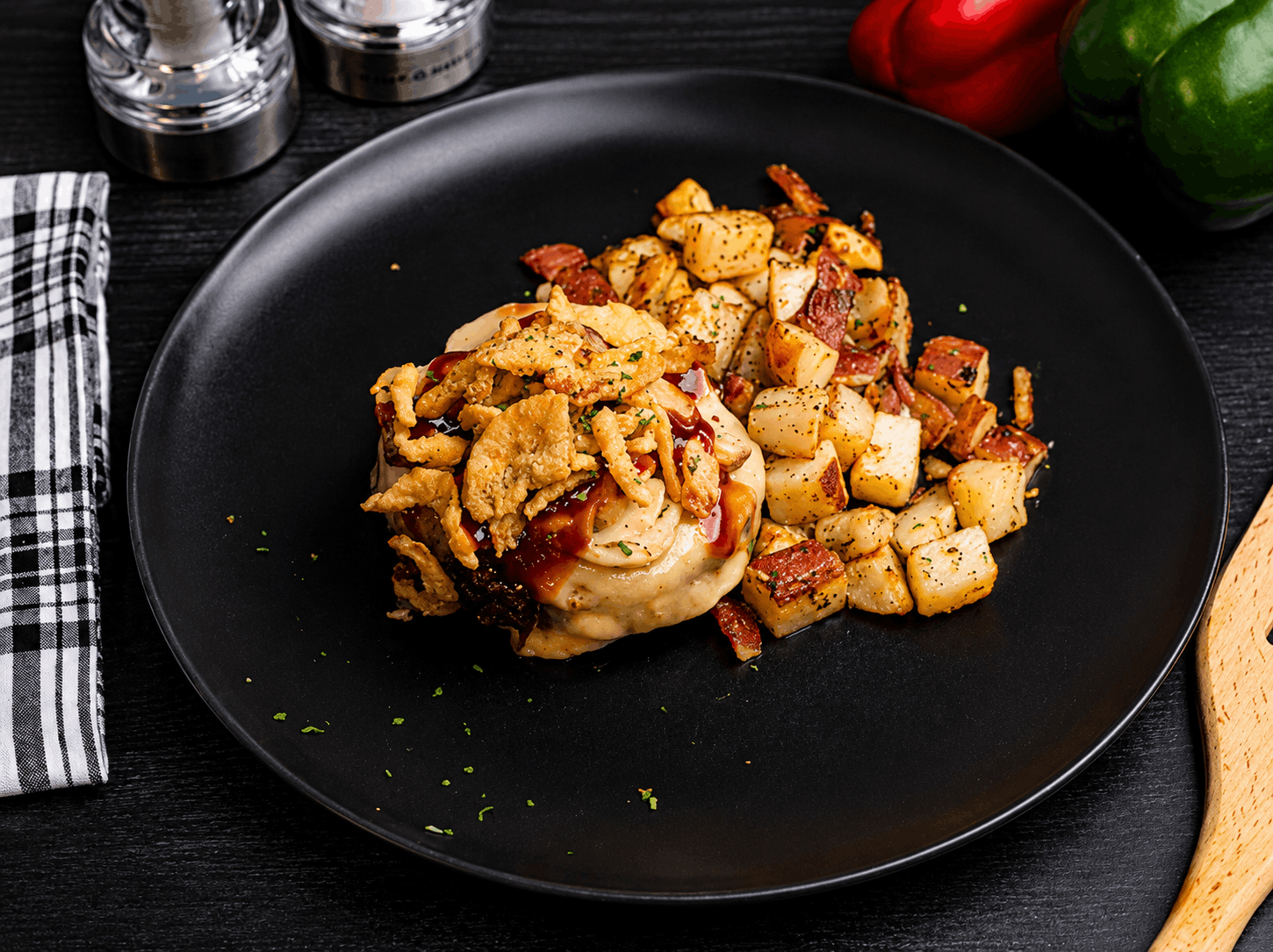 One all-natural 80/20 ground beef patty, lightly seasoned, cooked, and oven-finished to perfection. Glazed with our signature chipotle BBQ sauce, topped with a slice of pepper jack cheese, sautéed mushrooms and crispy onions. Served with oven roasted red potatoes.