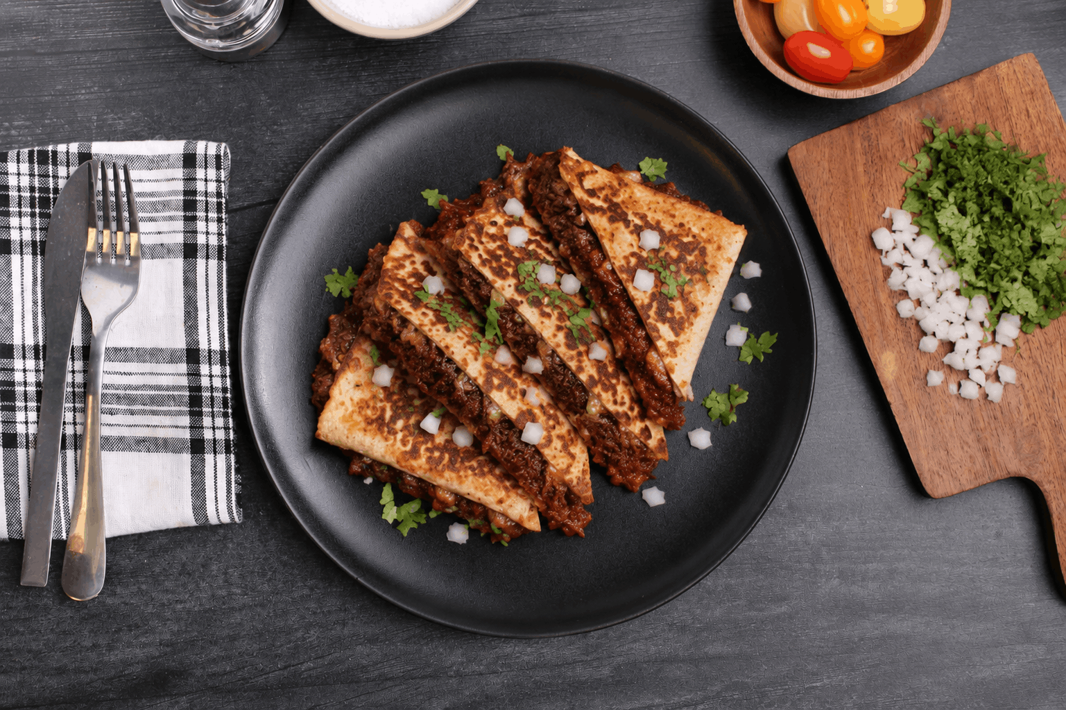 Slow-braised, tender beef short rib layered with a rich blend of provolone and mozzarella cheeses, then folded into a grilled tortilla until perfectly crisp. Finished with our smoky chipotle marinara sauce for a bold fusion of savory, cheesy, and slightly spicy flavors in every bite.