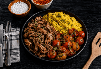 Mojo Shredded Pork with Yellow Rice & Pesto Roasted Tomatoes Mojo Shredded Pork with Yellow Rice & Pesto Roasted Tomatoes